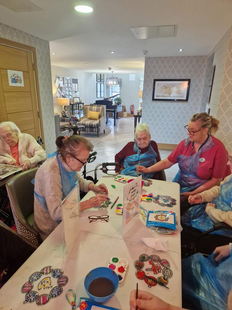 residents making easter decorations