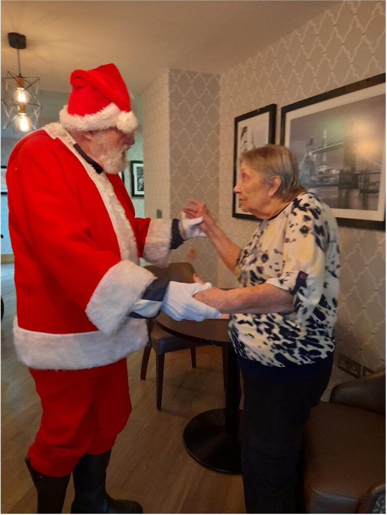 resident dancing with santa