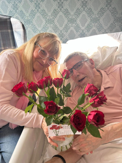 resident with a bouquet