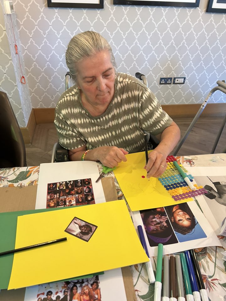 resident celebrating black history month through arts and crafts