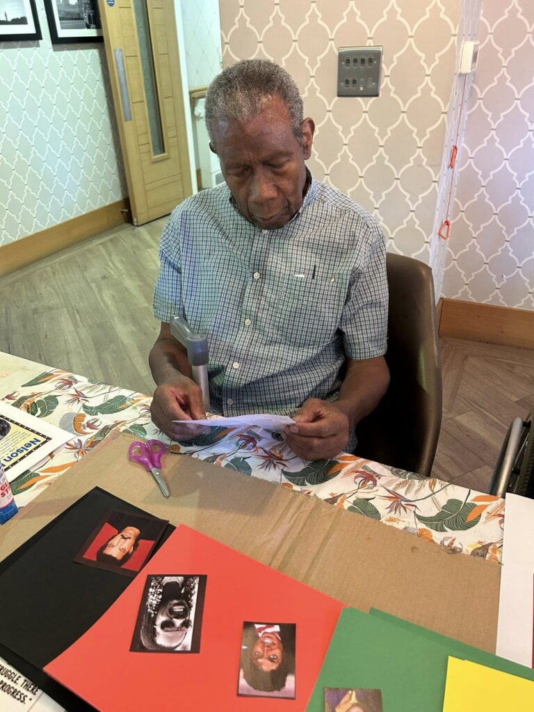 resident celebrating black history month through arts and crafts