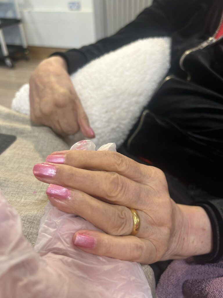 residents painting nails