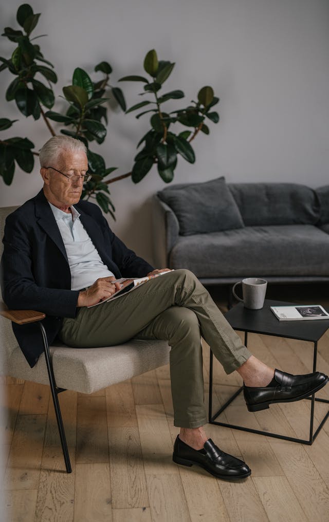 older man in a chair